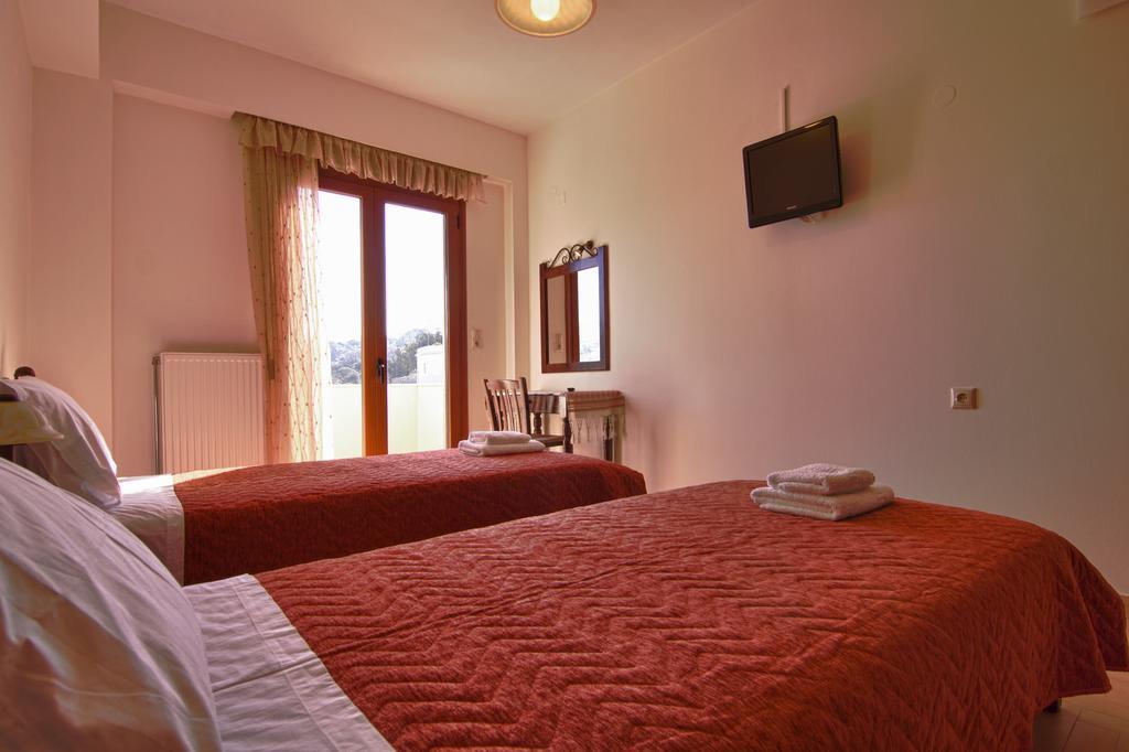 Petrochori Aparthotel Habitación foto